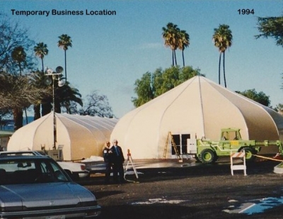 Above is a photo of the temporary business tents that were set up in the park where Fillmore City Hall stands today. Photo credit Fillmore Historical Museum.