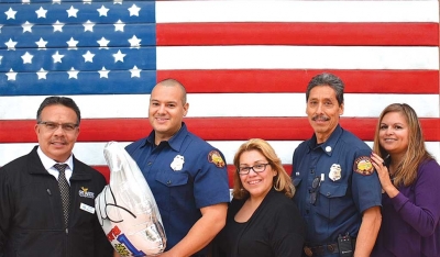 2016 Firefighter of the Year Michael Salazar. (l-r) Martin Guerrero, Michael Salazar, Irma Magana, Al Huerta & Ari Larson.
