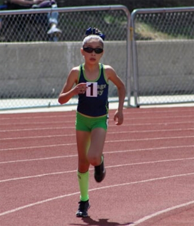 Distance runner Paola Estrada broke the 9-10 girls 1600m record at Co-Conference Championships; 5-48.64.