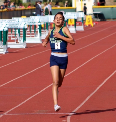 Distance runner Lindsey Ramirez broke three 11-12 girls 3200m records. PR 11,16.