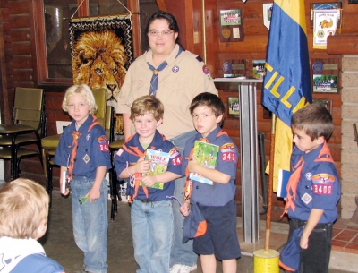 Shown with Mrs. Gerlack are Tiger Cubs Tiger Cubs: Niles Gerlack, Kelly Bires, Tommy Vargas and Junior Escoto.