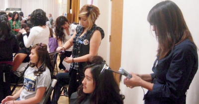 Beauticians worked their magic on two willing participants at FHS 2009-2010 Career Day.