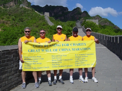 In China from left to right is Captain Randy Pentis, Sargent Paul Higason, Sargent Frank Underlin, Captain Dave Kenney and Captain Tim Hagel.