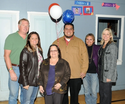 (l-r) Mike Mobley, Cindy Jackson, Jan Marholin, Citizen of the Year Buddy Escoto, Ari Larson, and Tammy Hobson.
