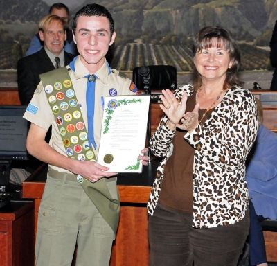 Esteban Almazan received a proclamation from Mayor Gayle Washburn for his Eagle Scout Rank.