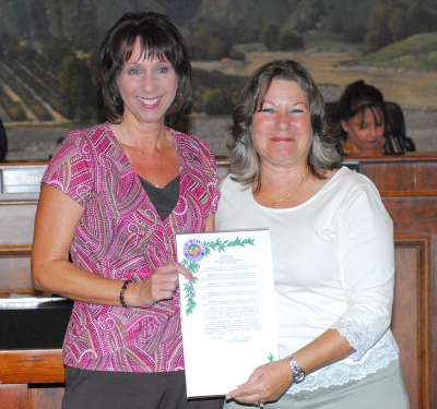 Pictured above (l-r) Community Services Supervisor Annette Cardona and Mayor Patti Walker. Cardona was Employee of the Quarter for April-June.