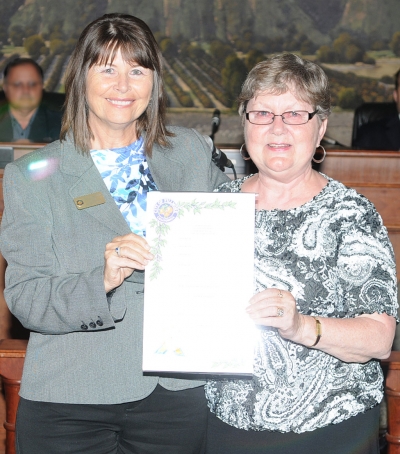 Recognition of Fillmore Senior Center volunteer Vivian Johnson. Mayor Gayle Washburn presents Senior Center volunteer Vivian Johnson with a Proclamation at Tuesday night’s council meeting. The Proclamation recognized Johnson’s service since 2008 as Board Secretary and Field Trip Chair; 2nd Term Representative for Fillmore on the Ventura County Area Agency on Aging; serves on the Senior Nutrition Task Force; and serves as Hostess at the Center’s welcome desk.