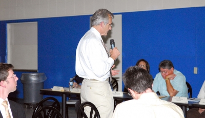 John Scoles spoke about use of the track.