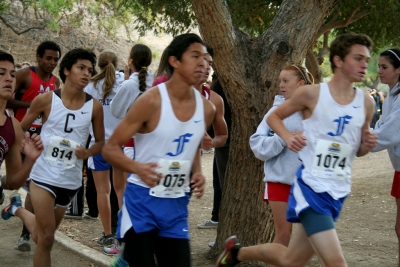 (l-r) Teammates Francisco Erazo and Justin Beach working the first mile loops at Mt. San Antonio College during CIF Prelims.