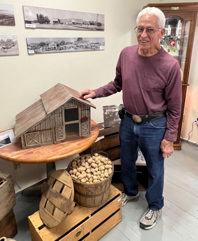 Jack with the Guiberson Barn on display at the museum. 