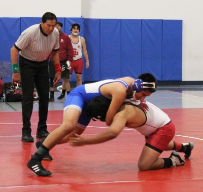 On Tuesday, December 10, 2024, FHS Wrestling took on rival Santa Paula in a dual meet for the Citrus Coast League Opener. Pictured is Fillmore’s Isaac Rivera during his match trying to keep his opponent down. Photo credit Head Wrestling Coach Michael Torres.