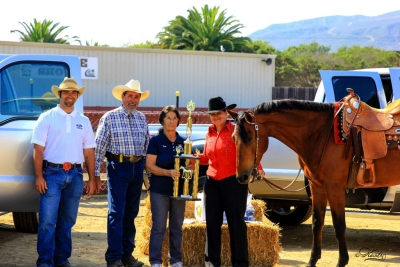 Matt Hardwick & Greg Gustafson of Ford of Ventura, Sue Fleczok of GLAPHC presenting the 2 day championship trophy to Karen Schott of Fillmore with her mustang 