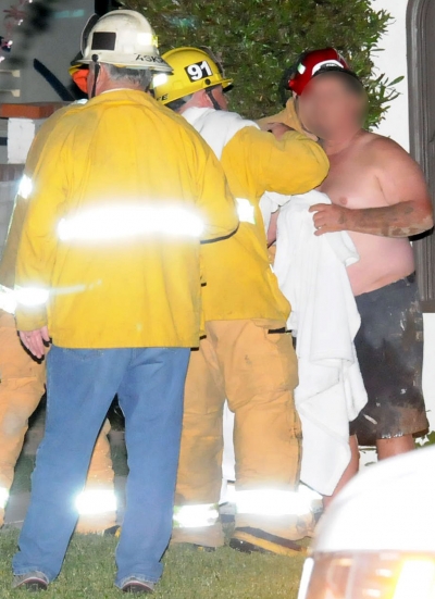 The unidentified man was cleaned off and treated for minor cuts and bruises by local firefighters.