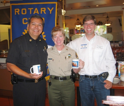 Fire Chief Rigo Landeros, Police Chief Monica McGrath, Rotary Club President Sean Morris.