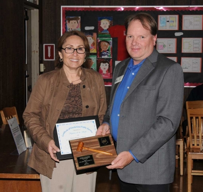 Virginia de la Piedra received a plaque from the Fillmore-Piru School District Board recognizing her 20 years as a Director.