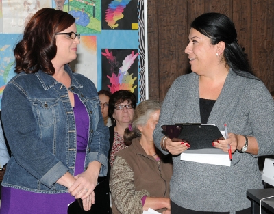 Chrissy Schieferle (right), principal of San Cayetano Elementary, and Maryellen Garcia (left) give a report on San Cayetano School. Schieferle also announced that Friday will be her last day. She has taken a job with Ventura County Education Department.