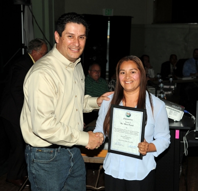 Board Member John Garnica and Migrant Parent of the Year Maria Pascual