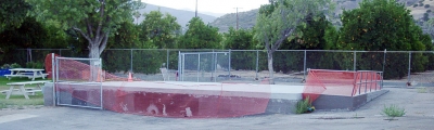 A concrete slab which had supported a temporary classroom at San Cayetano is being converted to a patio, and there will be steps from the patio to the kindergarten play area.