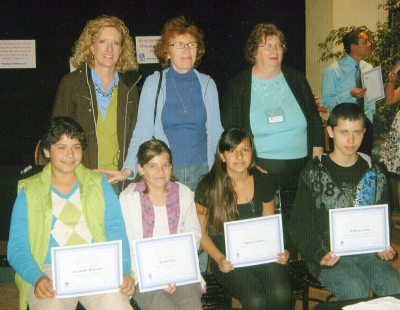 Soroptomist presented the Verna Padelford Creative Writing Awards, Wednesday, April 21st. Fillmore Middle School winners—Front Row (l-r)—Elizabeth Manzano, First Place—Poetry; Rachel Pace, Third Place—Poetry; Yaneli Enriquez, Second Place—Poetry;  Anthony  Larin, Second Place—Short Story. Not pictured were Felicity Zavala, First Place Winner—Short Story. Back Row (l-r)—Rachel Cone, Teacher/Coordinator; Susan Fitzgerald, Teacher; and Kathleen Briggs, Soroptimist Writing Awards Chair and judge. (K. Pace photo)