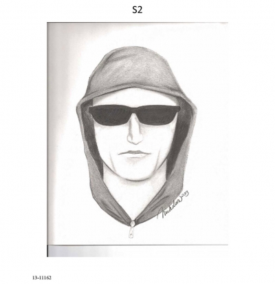 The suspect from the May incident (S2) was described as a White male, between 20 and 30 years old.  He was about 5’7” tall with a medium build.  He was wearing dark clothing, including a hooded sweatshirt, and dark sunglasses.  Sketch “S2” is a depiction of the suspect.