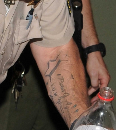 A deputy with Pete’s name and End of Watch date tattooed on his arm in memory of a fallen officer.