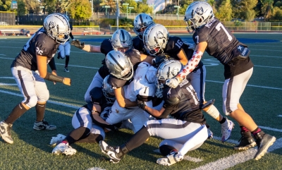 Fillmore Raiders Seniors Black took on the Calabasas Rams on Saturday, September 28. Pictured are a group of Raiders putting a stop to the Rams player to keep him from advancing. Final score Raiders 12 – Rams 29. Photo credit Crystal Gurrola. 