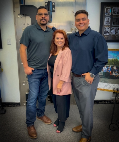 Pictured is Theresa Robledo with husband Henry Robledo and son Adrian Robledo.