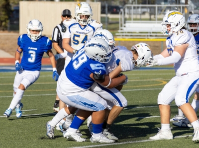 Pictured is FHS Varsity defense making a tackle against Agoura this past Friday night. 