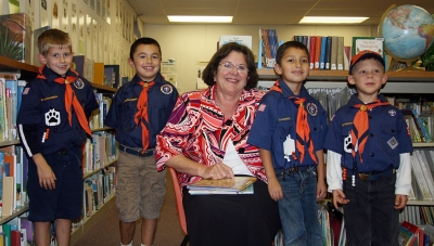 The Tiger Cubs of Pack 3400 recently visited the Piru Library. Pictured is librarian Cindy Escoto and “the Pack”.