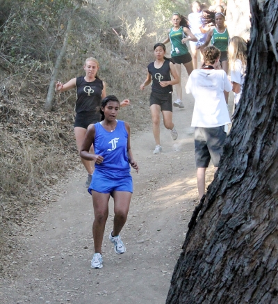 Justine DeLa Rosa competes against Oak Park and La Reina during league last week.