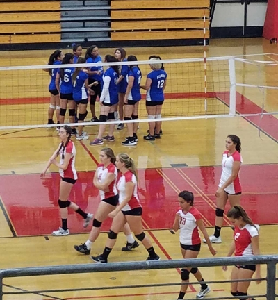 Fillmore J.V. Flashes huddle together before they take on Bishop Diego.