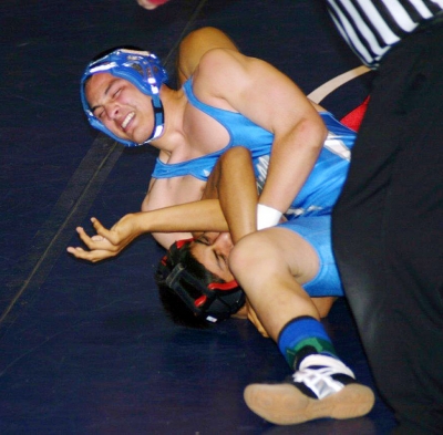Austin Davis gets the pin in his JV Match against Santa Paula Davis also took the JV title in his weight category.