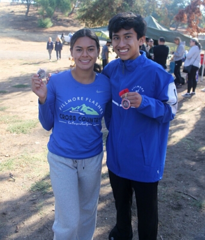 Clovis Invitational Medals (l-r) Seniors Aianna Tapia 10th Place, Michael Camilo Torres 2nd Place.