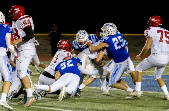 On Friday, October 20th, the Fillmore Flashes hosted their 2023 Homecoming game against Carpinteria and defeated them 31–14. This Friday, October 27th, the Flashes will host their Senior night against Port Hueneme High School, JV begins at 4pm, Varsity at 7pm. Above is Flashes Varsity taking down a Carpinteria player as he tries to advance down the field. Below, Flashes JV making the tackle to shut down the Carpinteria defense. Photo credit Crystal Gurrola. More JV & Varsity photos online at www.FillmoreGazette.com. Fillmore is now 6 – 3 overall on the season. Info courtesy https://www.maxpreps.com/ca/fillmore/fillmore-flashes/football/schedule/. 

