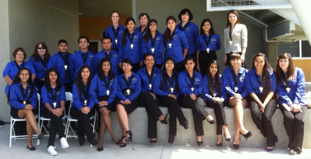 First row: (l-r) Banely Arevalo, Andrea Diaz, Faviola Palmerin, Beatriz Tovar Salcido, Daniela Valdovinos, Itzelle Iniguez, Sarahi Pascual, Neira Hernandez, Mariella Figueroa, Jessica Cortes, Yulissa Fregoso, Viridiana Quintana. Second row: Maria Gonzalez (Migrant Office) Jennifer Beal (Coach), Rafael Regalado, Jesus Mendoza, Luis Montejano, Yakeline Magana, Maria Fernada Magana, Alondra Minero. Third row: Jenny Bortins (Coach), Mary Schroefer (Coach), Jennifer Fitzpatrick (Coach), Briana Vargas, Jennifer Weir (Migrant Coordinator). Not pictured: Nancy Kirkpatrick (Coach).