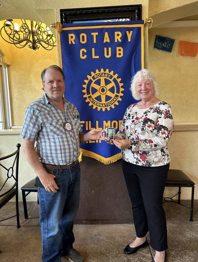 Above is Fillmore Rotary Club President Scott Beylik presenting a Rotary mug to last week’s guest speaker, Sue Yamamoto. She is a member of Santa Paula Rotary and initially went to school to become a dental hygienist, which she did for a few years. She became interested in flying, took lessons, and became an instructor at Santa Paula Airport. Later she decided she wanted to fly large planes, so she went through extensive training and became a co-pilot and finally a Captain. Over the years she flew from Santa Barbara, Chicago, and LA and flew all of the large planes. She was the first woman to fly the 737 and worked for United Airlines. After her children were older, she also flew internationally. Photo courtesy Rotarian Martha Richardson.