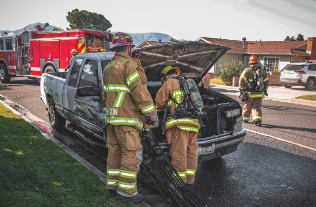 On Friday, November 3rd, at 10:01 a.m., Fillmore Fire Department responded to a vehicle fire at B Street and Sespe Avenue. Arriving firefighters found a truck parked with smoke coming out of the front of the vehicle. While units were enroute, a citizen used a water hose to put the fire out. No injuries were reported, and the cause was being investigated by the Fillmore Fire Department. Photo credit Angel Esquivel-AE News.