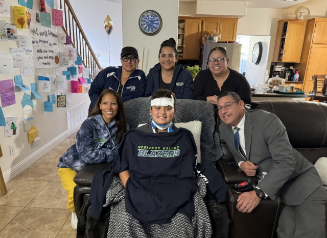 Pictured above is Brandon Alvarez with the Heritage Valley Blazers Board Members who came by to visit, play video games and bearing gifts. They also made a considerable donation towards family expenses towards his recovery and brought some cool HV Blazers fan gear.  