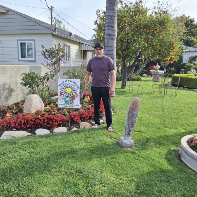 Fillmore Civic Pride announces the 2024 March Yard of the Month winner, Eric Quintero, owner of EQ Landscaping; his home is in the 200 block of Saratoga Street. Above is his brother Jesse Quintero, standing in for Eric. Photo credit Fillmore Civic Pride.