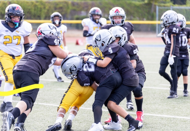 On Saturday, August 23rd, Fillmore Raiders Youth Football and Cheer kicked off the 2025 season at the Fillmore High Football Stadium. Pictured above is the Raiders Freshman D2 game against North Valley Bears. Inset, the Raiders Bantams Silver D2 game against Oxnard Knights. Photo credit Crystal Gurrola. 