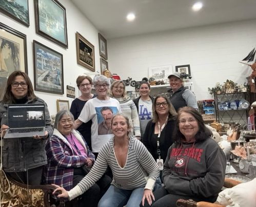 Pictured (l-r) are Pam Smith on Zoom, Carina Forsyth, Olga Stanahan (guest), Wendy Wagner, Sandra Butts, Houry Meguerditchian (owner of Tracks where the meeting took place), Alejandra Martinez (guest), and Taurie Banks; next row Brandy Hollis, Danielle Quintana (current club president), and Mimi Burns.