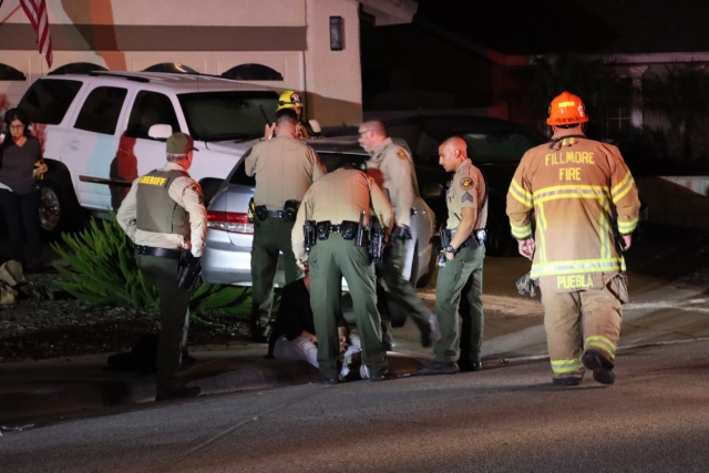 On Friday, October 20th, at 11:15 pm, Fillmore Police Department, Fillmore City Fire Department and AMR Paramedics were dispatched to a reported traffic collision in the 800 block of Santa Clara Street, Fillmore. Arriving deputies found two parked vehicles damaged along with a vehicle parked in the garage driveaway damaged. A male subject was arrested for California Vehicle Code (VC) 23152(a)--Driving Under the Influence of Alcohol and VC 20002(a)-Hit and Run. The subject was booked at the main jail. Photo credit Angel Esquivel-AE News.