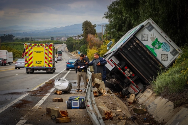 On Monday, May 1, at 11:04am, Ventura County Fire Department, Fillmore Fire City Fire, AMR Paramedics and California Highway Patrol were dispatched to a reported traffic collision on westbound SR-126 and Fine Road, Fillmore. Arriving firefighters reported a large box truck versus a guardrail. The driver was able to exit the box truck and suffered minor injuries, Caltrans was also dispatched to the scene for 150 feet of guardrail damage (inset). Cause of the crash is being investigated by the CHP-Moorpark office. Photo credit Angel Esquivel-AE News.