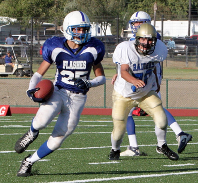 Austin Davis #25 pictured above, scored 3 touchdowns-picking up a fumble the first play of the game & running it in for a touchdown--he also ran one in from the backfield & caught one from Corey Cole, about a 40 yd pass. Johnny Golson threw a touchdown pass to Ben Fernandez, about a 35 yd pass. Jordan Davis had an interception. Ty Casey ran the ball well with 10 carries for about 100 yds. Joel Amaro kicked 3 field goals. On defense Anthony Edwards, Sam Orozco, Angel Beccera, & Johnny Golson played well. Fillmore beat Channel Islands 27-21.