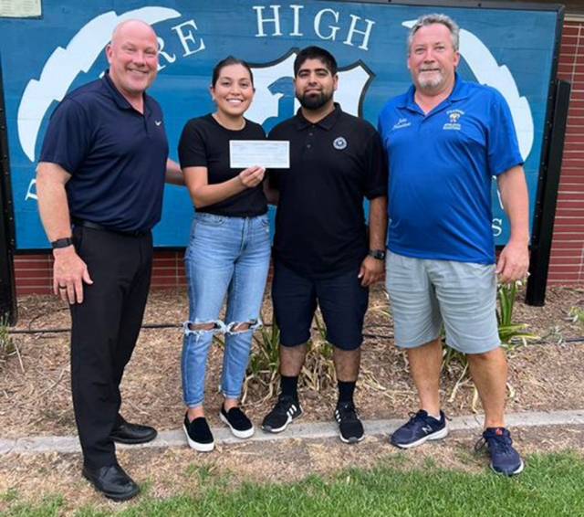 We would like to thank Ate05 Grub shack for presenting a generous donation of $1,500 to the Fillmore High School Athletics programs. Back in June they held a Cornhole Tournament Fundraiser at Britt Park in Piru and donated a portion of the proceeds. Pictured above left to right are new FHS Principal Keith Derrick, Ate05 Grub Shack owners Anika Romano and Joseph Magana, along with Athletic Boosters Club President John Holladay. Look up Ate05 Grub Shack for your next catering needs. Photo credit Anika Romano.