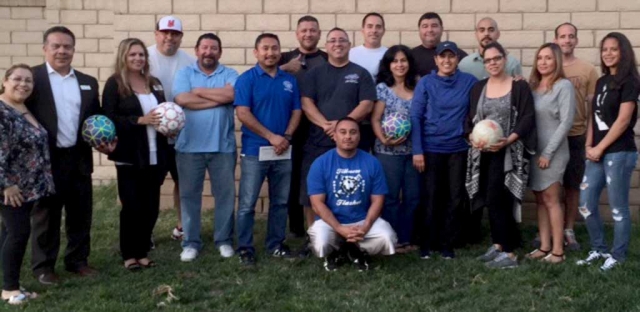 AYSO named Youth Sports Group of the Year by the Fillmore Chamber of Commerce! Pictured left to right: Irma Magana, Martin Guerrero, Ari Larson, Martin Herrera, Enrique Navarrete, Arnold Munoz, Joe Ordaz, Alfonso Romero, Omero Martinez, Frank Garibay, Maria Garibay, Greg Aguilar, Leti Garcia Cedillos, Sergio Lara, Lydia Lara, Yaneli Lara, Willie Diaz & Elisa Carreno.