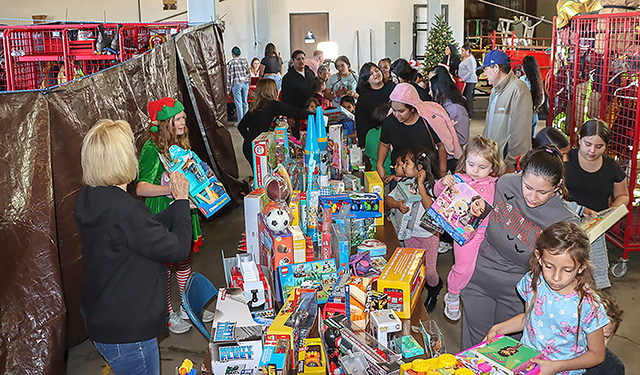 On Saturday morning, December 13, Fillmore residents lined up at the Fillmore Fire Station for the 2025 Annual Toy Giveaway. Each child had their picture taken with Santa Claus, and received a new toy, book, coat, and socks. Cotton Candy and popcorn were also handed out. The children and their families were able to visit with first responders and learn safety tips while enjoying the event. Photo credit Angel Esquivel.
