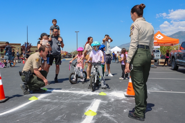 On Saturday, May 11, Fillmore Citizen’s Patrol hosted their Annual Bicycle Safety Rodeo at Rio Vista Elementary School, along with help from the Fillmore Fire and Ventura County Sheriff’s Office. The overall goal was to educate parents and children about the safety aspects of riding a bicycle, skateboard, or scooter on streets. A Bicycle Safety Rodeo is a safety clinic where young riders can learn about proper safety and the rules of the road. There was a bicycle safety course chalked out for basic riding skills and more. Above are photos of all the fun at this year’s Bike Rodeo. Photo Credit: Angel Esquivel-Firephoto_91. 
