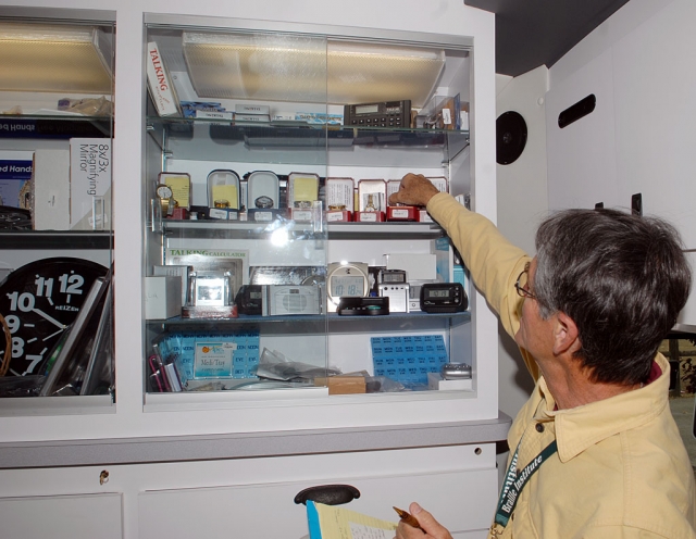 Anchored in Santa Barbara, the mobile unit travels to locations offering exams and products such as large-face watches and clocks, as shown by Bob Basche, mobile solutions driver. Brailleinstitute.org.