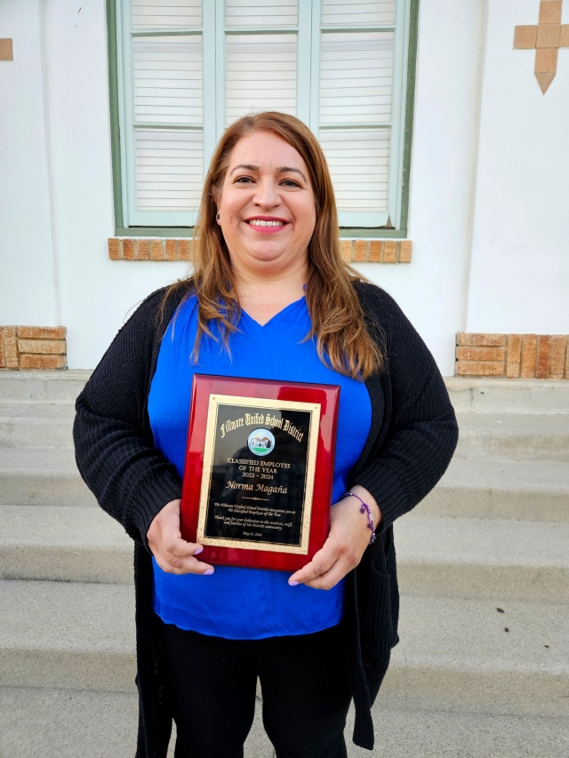 On May 21, Fillmore Unified recognized the annual Students and Staff of the Year awards, mentioned on page 1. Pictured right are this year’s Classified Employee of the Year, Norma Magaña-Office Manager, Piru Elementary School; Certificated Employee Year, Greg Godfrey-Music Teacher / Fillmore High School & Administrator of the Year; and Hector Vargas, Maintenance Manager. 